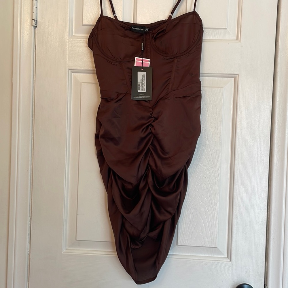 Pretty little things strapped dress w/ corset detail & ruched skirt.